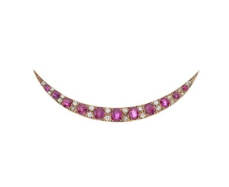 A late Victorian gold ruby and old-cut diamond crescent brooch, principal ruby measures approximately 5 by 4.3mm, estimated t