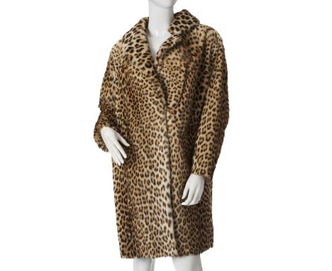 A 1960s knee-length leopard fur coat, featuring a notched lapel collar, two outer pockets and two rear side belts, chest meas