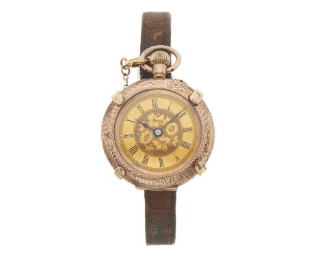 A fob watch with a Kollmar & Jourdan holderCase: 9ct gold. Hallmarks for Chester 1907. Case number 408373. floral and foliate