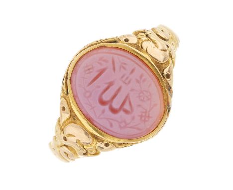 A mid Victorian 15ct gold carnelian intaglio seal signet ring, carved to depict an Arabic script, hallmarks for Birmingham 18