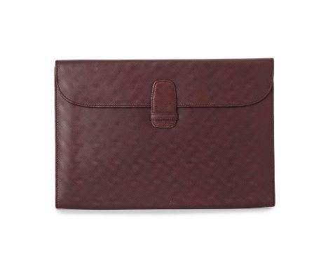 Bottega Veneta, a vintage Marco Polo document case, featuring a textured burgundy leather exterior, with a flap closure and o