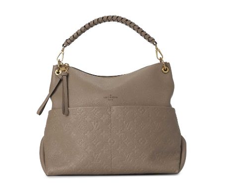 Louis Vuitton, an Empreinte Maida hobo handbag, crafted from beige leather with monogram embossed detailing, featuring dual f