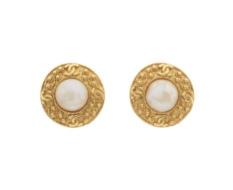 Chanel, a pair of clip-on earrings, featuring an imitation pearl to the centre and a textured gold-tone surround with small C