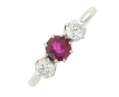 A mid 20th century 9ct gold ruby and circular-cut diamond three-stone ring, estimated total diamond weight 0.45ct, H-I colour