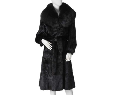 Regency Furs, a black musquash fur coat with fox fur collar, featuring hook and eye clip fastenings and a belted waist, a wid