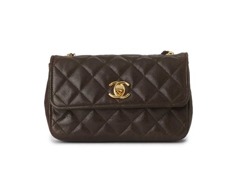 Chanel, a vintage Mini Classic Flap handbag, crafted from brown quilted lambskin leather, with 24ct gold-plated hardware, fea