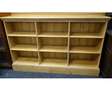 PINE THREE SHELF LOW BOOKCASE with two divisions, dental cornice, 175 x 34 x 110cms