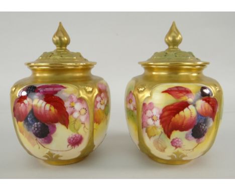 TWO SIMILAR ROYAL WORCESTER POT POURRI VASES AND COVERS hand painted with autumnal berries and foliage by Kitty Blake, both s