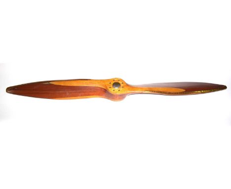 A laminated mahogany propeller, for a de Havilland Gipsy Major engine as fitted to the de Havilland Tiger Moth, the center wi