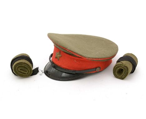 A Japanese Imperial army student's cap; and two green woollen puttee straps. 