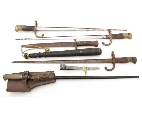 A collection of bayonets, including: a WWI 1886 pattern French Lebel epee bayonet with scabbard; three French 19th Century gr