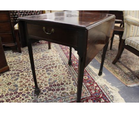A GEORGIAN MAHOGANY PEMBROKE TABLE AFTER A DESIGN BY THOMAS CHIPPENDALE