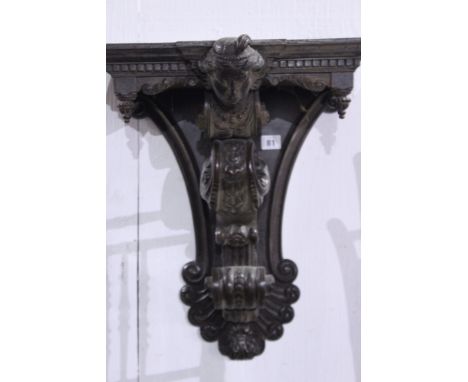 A VICTORIAN CARVED OAK WALL BRACKET