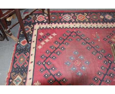 TWO LARGE ANTIQUE TRIBAL KELIM PANELS OF SIMILAR DESIGN.
 
originally one carpet but with losses at the cut edge