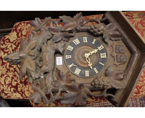 A 19TH.C.BLACK FOREST CUCKOO CLOCK WITH THREE TRAIN WEIGHT DRIVEN MOVEMENT