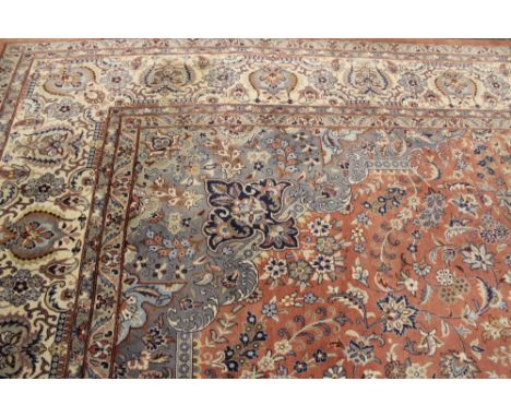 AN ORIENTAL CARPET OF CLASSIC PERSIAN DESIGN. 360 X 275 CMS