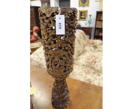 AN UNUSUAL COLONIAL CARVED AND PIERCED WOOD TABLE LAMP