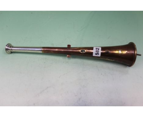 AN UNUSUAL HALLMARKED SILVER AND COPPER PLATED TABLE LIGHTER IN THE FORM OF AN OVERSIZED HUNTING HORN