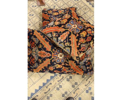 THREE ANTIQUE PERSIAN CARPET PANELS MOUNTED AS CUSHIONS