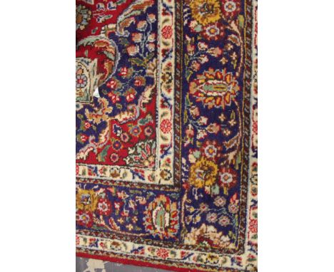 A PERSIAN SMALL CARPET OF CLASSIC DESIGN