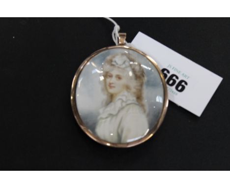 AN OVAL WATERCOLOUR MINIATURE PORTRAIT OF A YOUNG WOMEN IN A WHITE GEORGIAN DRESS, IN YELLOW METAL FRAME.