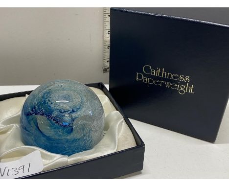 A boxed Caithness paperweight 
