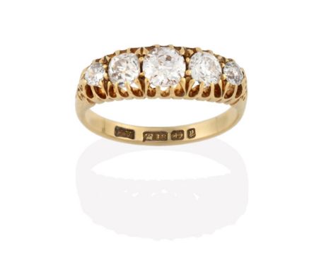 An 18 Carat Gold Diamond Five Stone Ring, the graduated old cut diamonds in yellow claw settings, to a plain polished shank, 