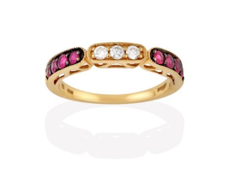 A Ruby and Diamond Half Hoop Ring, by LeVian, three round brilliant cut diamonds flanked by four round cut rubies, in yellow 