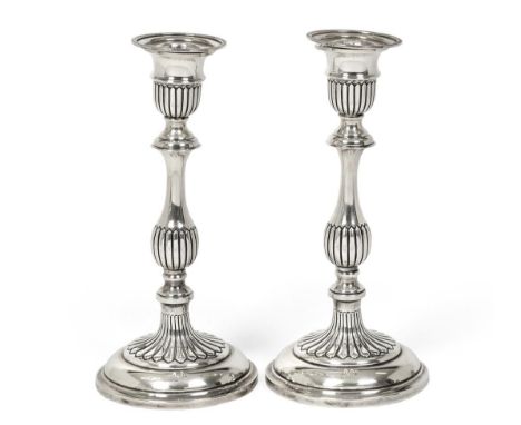 A Pair of George V Silver Candlesticks, by S. Blanckensee and Son Ltd., Birmingham, 1922, each on round part gadrooned base w