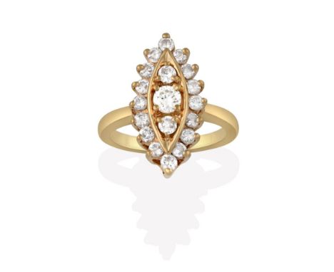 A Diamond Ring, the navette form set throughout with round brilliant cut diamonds, in yellow claw settings, to a tapered shou