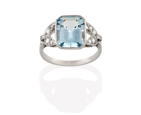 An Aquamarine and Diamond Ring, the emerald-cut aquamarine to leaf motif shoulders set throughout with round brilliant cut di