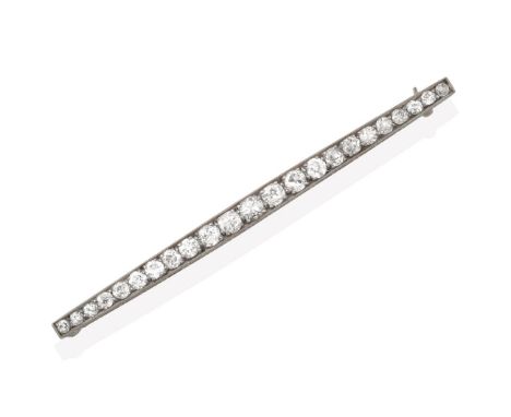 A Diamond Bar Brooch, the tapering bar set throughout with graduated old cut diamonds, in white claw and millegrain settings,