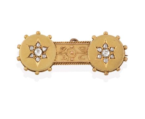 A Victorian Diamond Bar Brooch, two yellow circular plaques each with a star motif set with old cut and rose cut diamonds joi