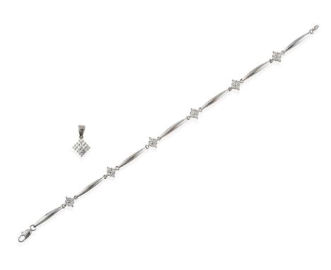 A Diamond Bracelet, formed of six round brilliant cut diamond clusters in white claw settings, interspaced by torpedo plain p