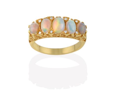 An Opal and Diamond Ring, the five graduated oval cabochon opals with eight-cut diamond accents, in yellow claw settings, to 