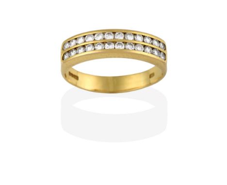 An 18 Carat Gold Diamond Half Hoop Ring, the two rows of round brilliant cut diamonds in yellow channel settings, to a plain 