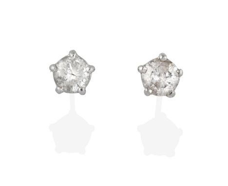 A Pair of Diamond Solitaire Earrings, the round brilliant cut diamonds in white claw settings, total estimated diamond weight