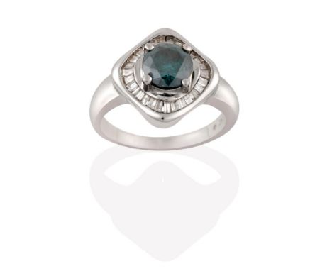 A Zircon and Diamond Cluster Ring, the blue-green zircon in a white claw setting, within a border of tapered baguette cut dia