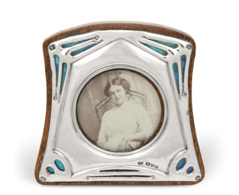 An Edward VII Silver and Enamel Photograph-Frame, by James and William Deakin, Chester, Possibly 1904, shaped oblong and with