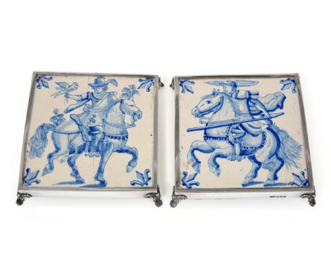 A Pair of George V Silver-Mounted Ceramic Trivets, by Charles Turman Burrows, Birmingham 1910, each square and on cast foliag