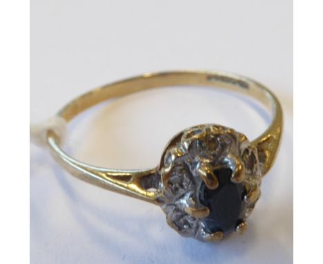 A 9-carat gold sapphire and diamond ring