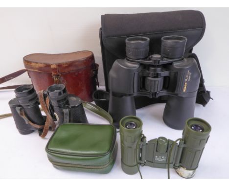 Three pairs of binoculars: Carl Zeiss 'Deltrinem' 8 x 30, engraved 'P.H. Cookson - Bachelors' Club, W1'; Nikon 10 x 50;Japane