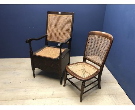 Oak framed armchair, with bergere back and seat, opening to reveal a white china commode with lid, and another small bergere 