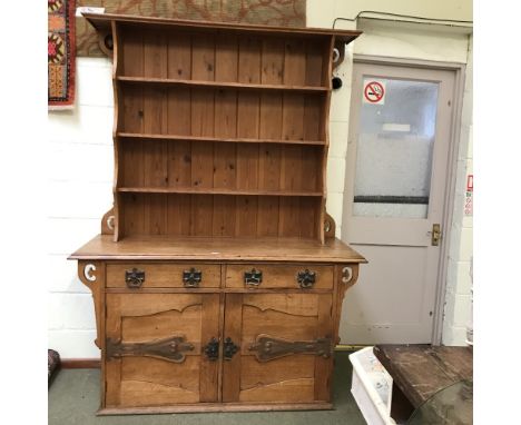 Oak 'Arts &amp; Craft' Welsh dresser, 3 shelf plate rack over the base containing 2 cupboards with a pair of drawers above,15