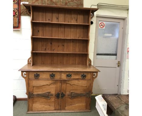 Oak 'Arts &amp; Craft' Welsh dresser, 3 shelf plate rack over the base containing 2 cupboards with a pair of drawers above,15