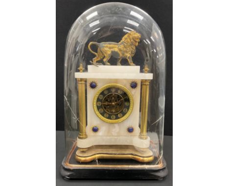 A 19th century French gilt metal mounted alabaster mantel clock, the dial inscribed with Arabic numerals, eight day movement,