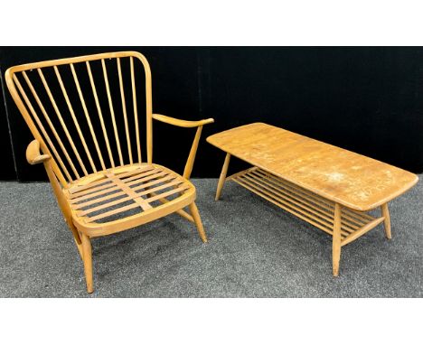 An Ercol 203 model beech stick-back open armchair, and a 459 model elm and beech coffee table, (2). 