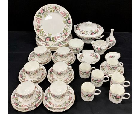 A Wedgwood ‘Hathaway Rose’ pattern table service for six including; six six dinner plates, lidded tureen, six tea cups and sa