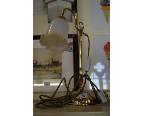 A good quality brass table lamp with milk glass shade