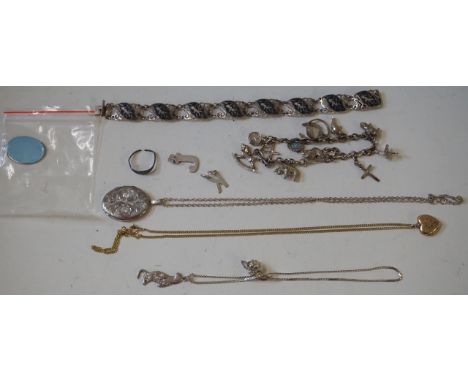 A 9ct yellow gold necklace and heart shaped locket, approx 3.3gms, and a selection of silver/white metal jewellery to include
